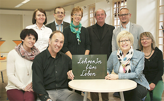 Fotos Luschner mit Direktor Reinhold Sickinger und mit Kollegen