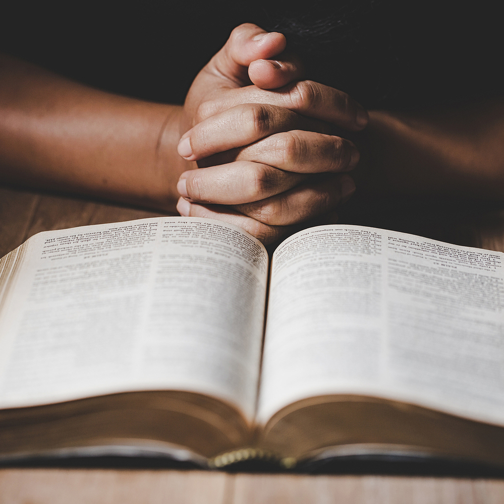 Christian life crisis prayer to god. Woman Pray for god blessing to wishing have a better life. woman hands praying to god with the bible. begging for forgiveness and believe in goodness. 