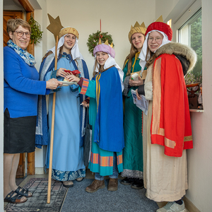 Foto: Sternsinger werden mit köstlichen Buchteln verwöhnt