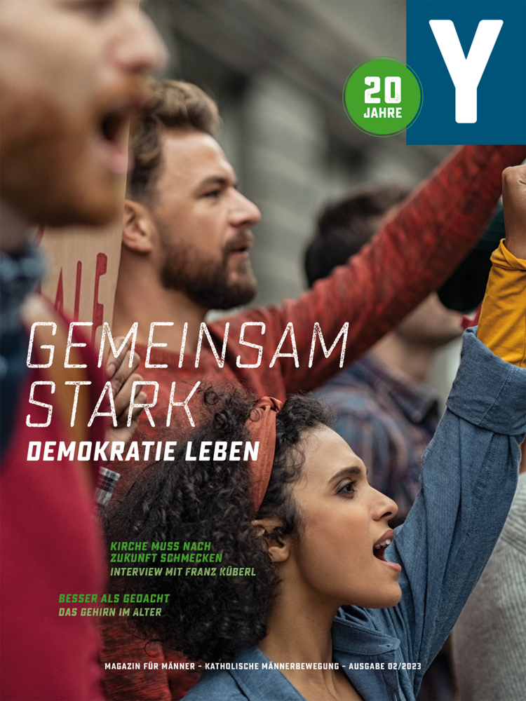 Das Cover des Männermagazins Ypsilon zeigt Menschen bei einer Kundgebung