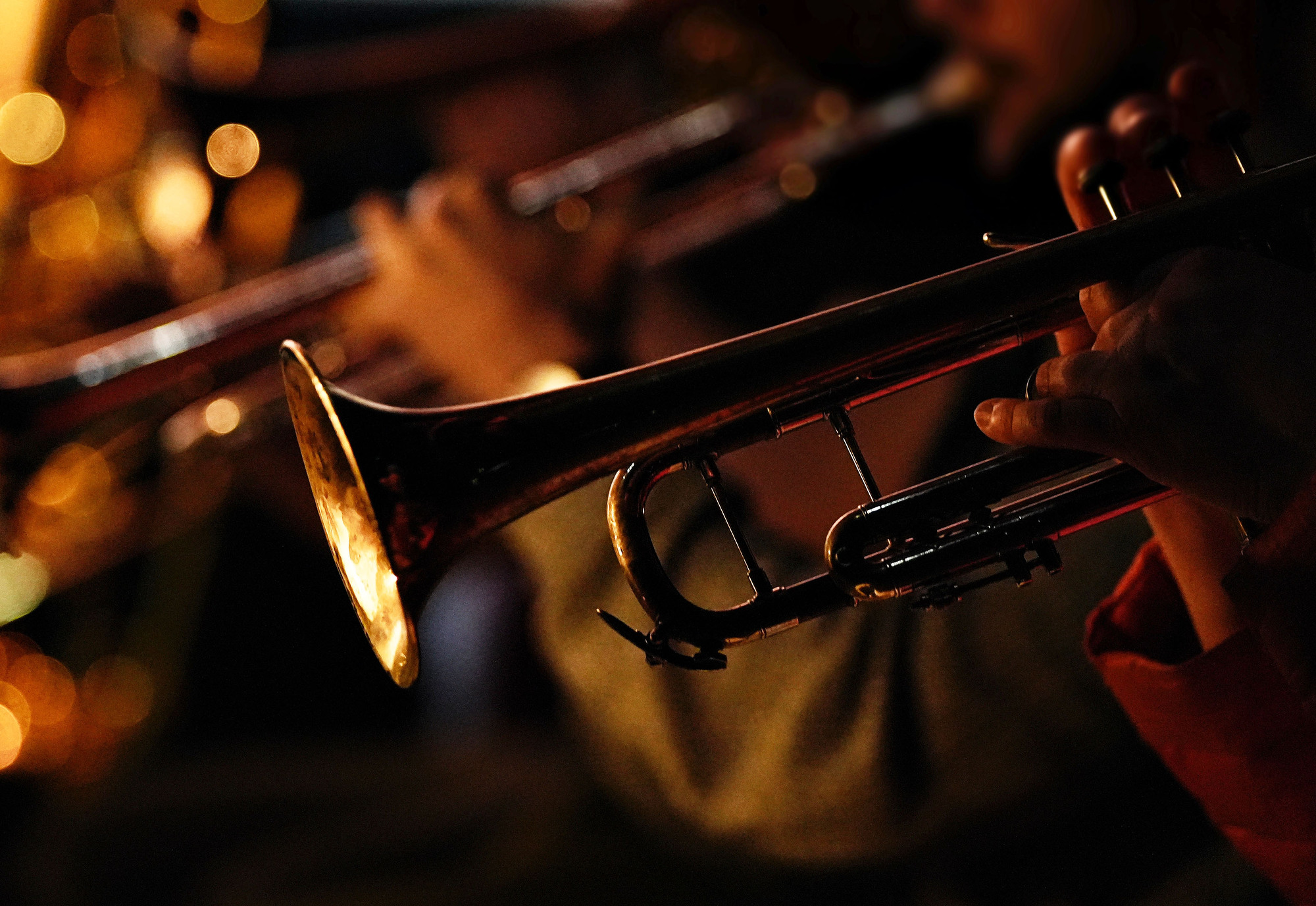 Close up of trumpet players performing in jazz ensemble