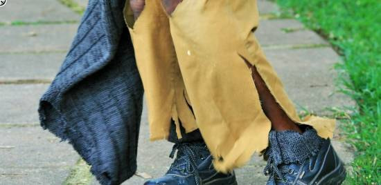 Füße eines Obdachlosen