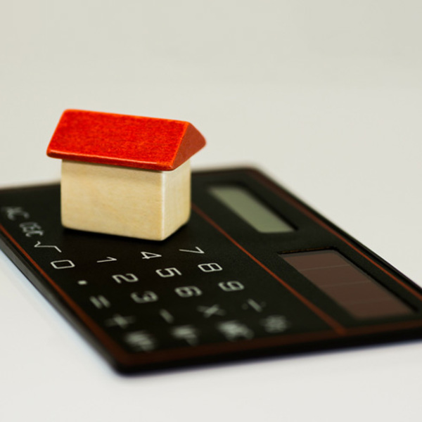 Taschenrechner mit Haus