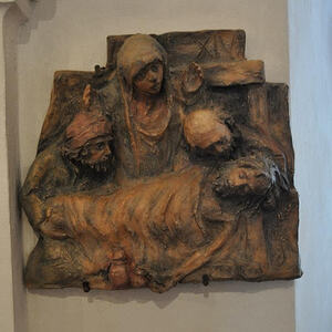 Jesus wird ins Grab gelegt.