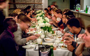 Guests attend a Refugees Welcome dinner at Lapis restaurant in Washington, D.C. The goals of the evening: to bring locals together with refugees in their community and to break barriers by breaking bread.
