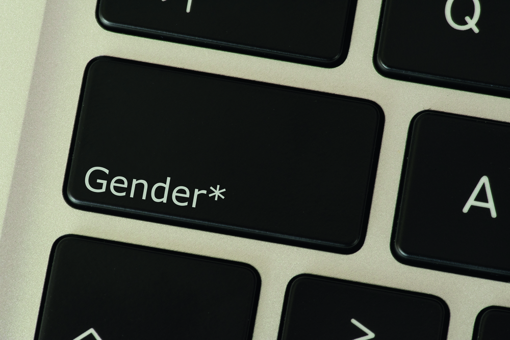 Tastatur mit dem Wort Gendern und Sternchen