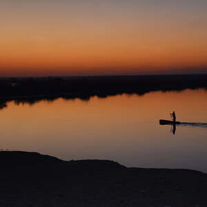 Sonnenuntergang am Okavango