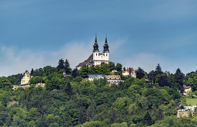 City views of the state capital Linz Austria with churches, cathedral, mountain Pöhlberg