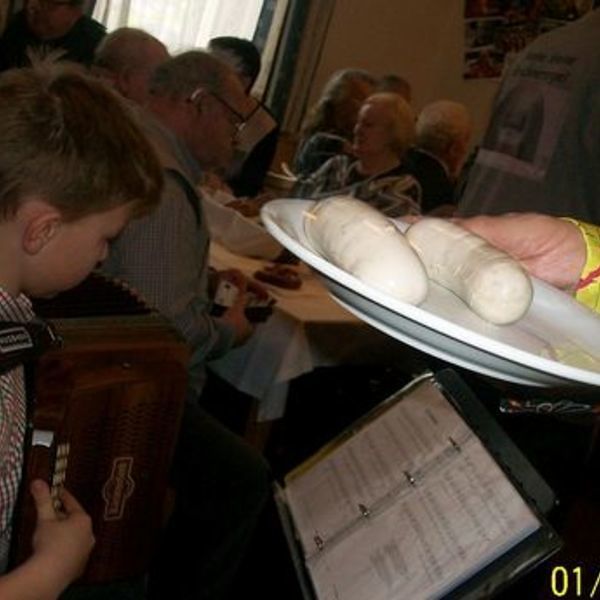 Weißwurstessen in St. Quirinus